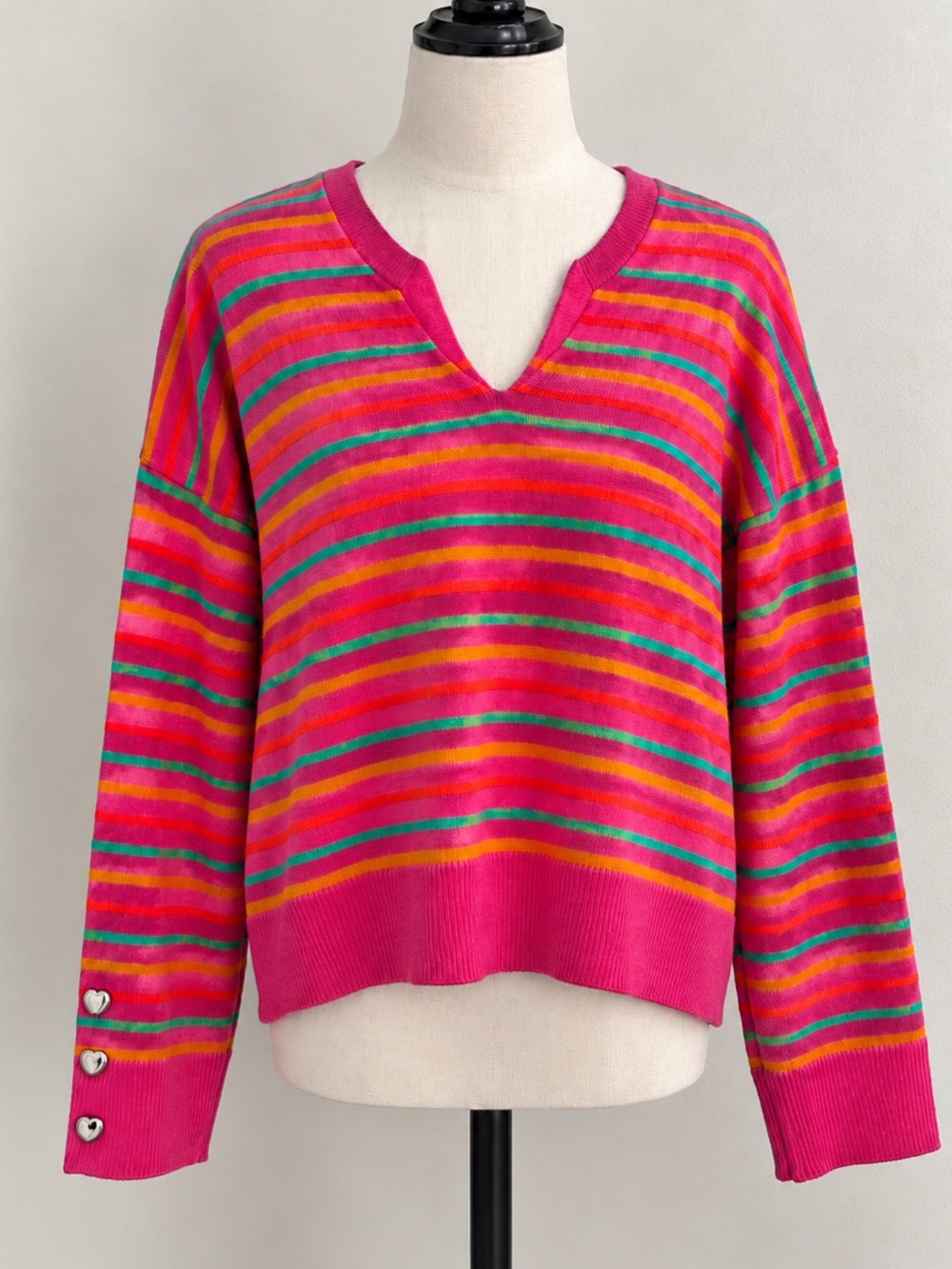 Bright Pink Striped V-Neck Sweater with Colorful Accents